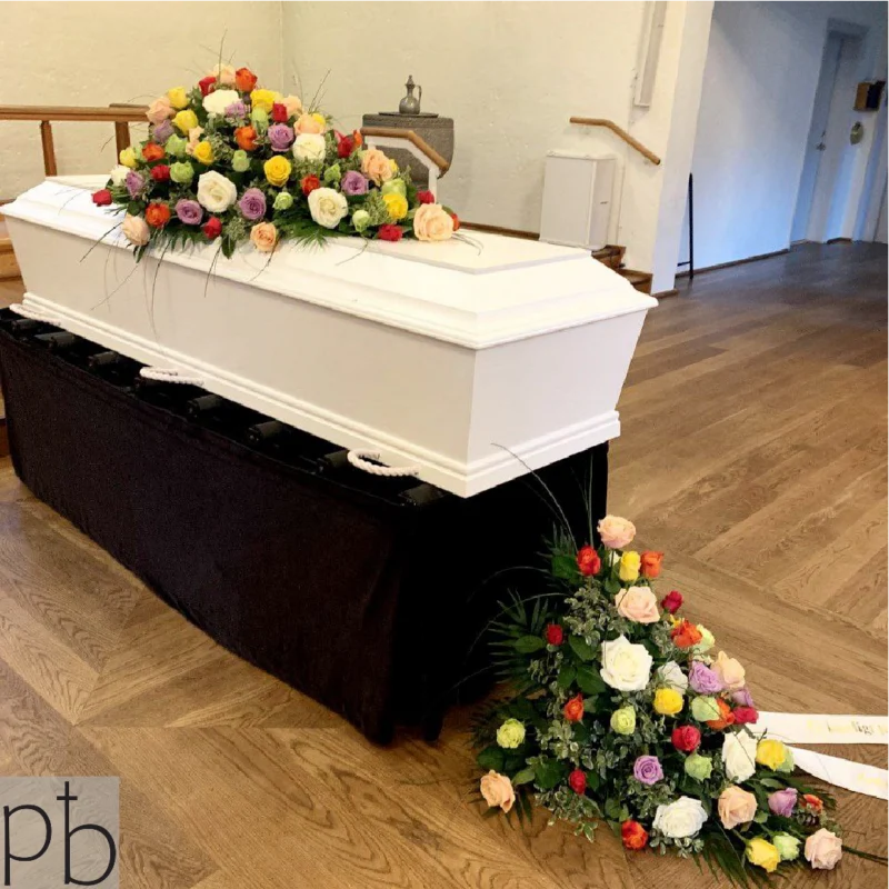 Blomsterarrangement til begravelse fra ParadisBlomster som en værdig og respektfuld afskedshilsen